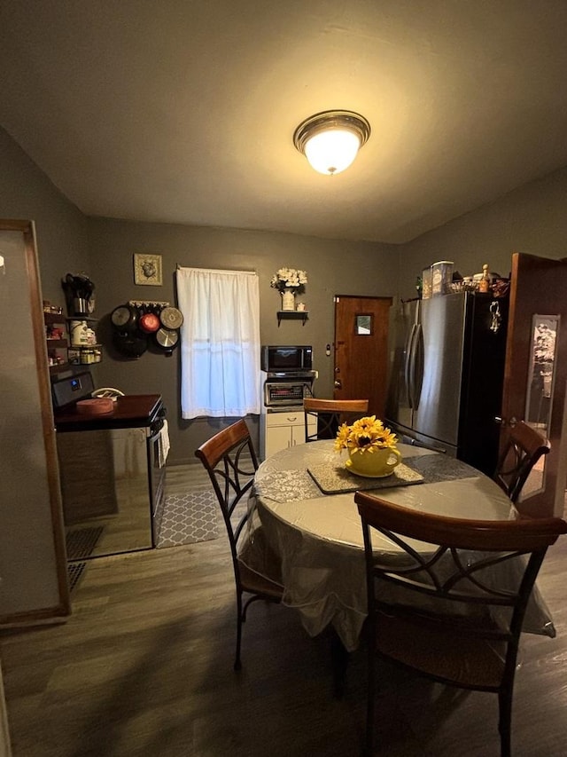 484 Hickory Pl, Elgin, IL 60120 - dining area featuring wood finished floors and baseboards
