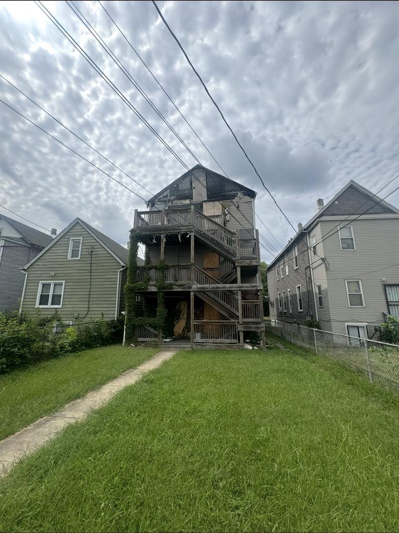 5427 S Princeton Ave, Chicago, IL 60609 - rear view of property with stairs and a deck