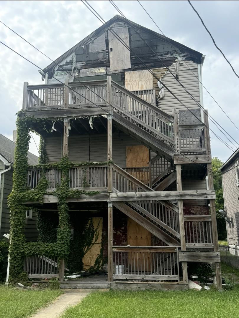 5427 S Princeton Ave, Chicago, IL 60609 - rear view of house featuring stairway and a deck