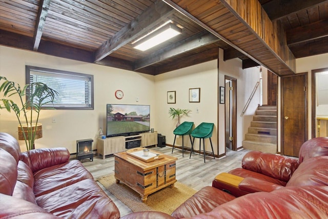 608 E Webster St, Polo, IL 61064 - living room featuring wooden ceiling with exposed beams, stairway, light wood-style floors, and baseboards