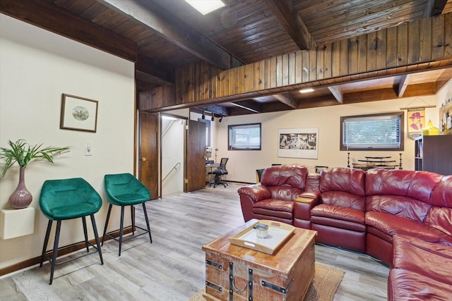 608 E Webster St, Polo, IL 61064 - living area featuring wood ceiling with exposed beams, baseboards, and light wood-type flooring