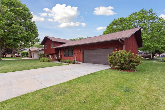 608 E Webster St, Polo, IL 61064 - split level home with an attached garage, driveway, and a front yard