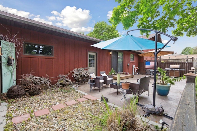608 E Webster St, Polo, IL 61064 - view of patio with a hot tub, a grill, and an outdoor living space