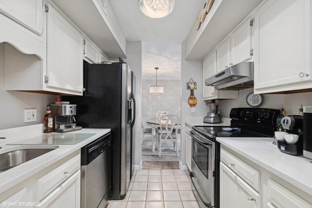 565 Shorely Dr Unit 202, Barrington, IL 60010 - kitchen featuring appliances with stainless steel finishes, under cabinet range hood, white cabinets, and light countertops