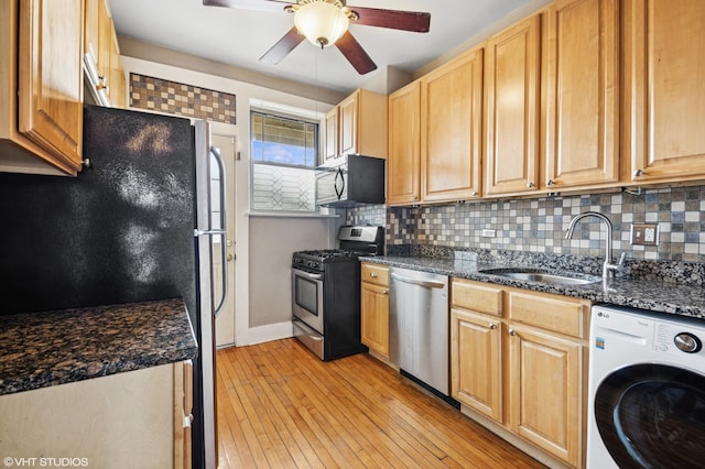 800 S Oak Park Ave Unit 3N, Oak Park, IL 60304 - kitchen with washer / dryer, appliances with stainless steel finishes, a sink, ceiling fan, and decorative backsplash