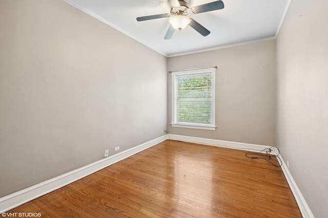 800 S Oak Park Ave Unit 3N, Oak Park, IL 60304 - unfurnished room with wood finished floors, baseboards, a ceiling fan, and crown molding