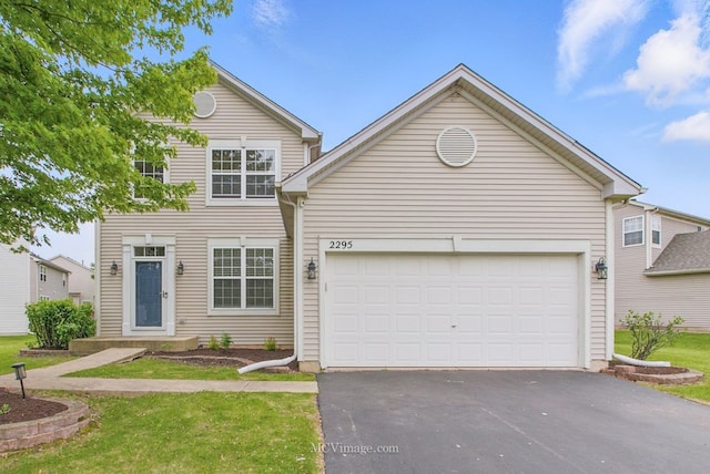 2295 Shiloh Dr, Aurora, IL 60503 - traditional-style house featuring asphalt driveway and an attached garage