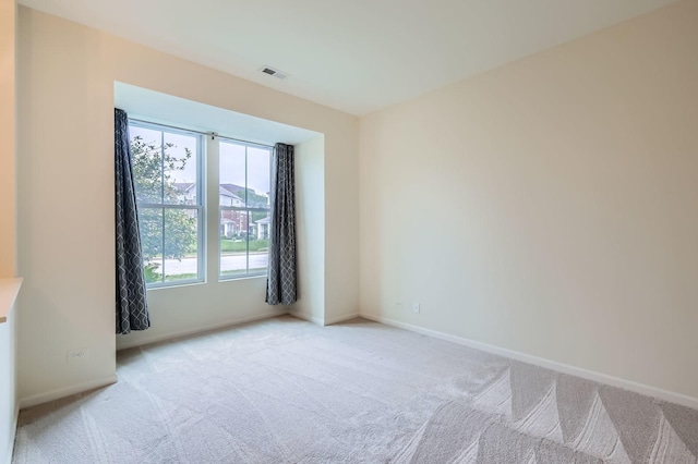 203 W Hyde St, Arlington Heights, IL 60005 - unfurnished room featuring light carpet and baseboards