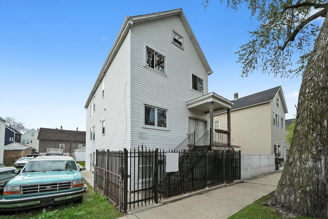 4446 S Wood St, Chicago, IL 60609 - view of front of property with a fenced front yard and a gate