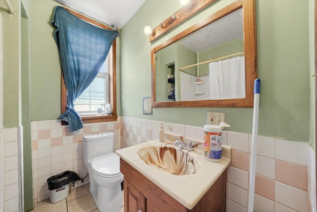 4446 S Wood St, Chicago, IL 60609 - full bath with tile walls, tile patterned flooring, wainscoting, toilet, and vanity