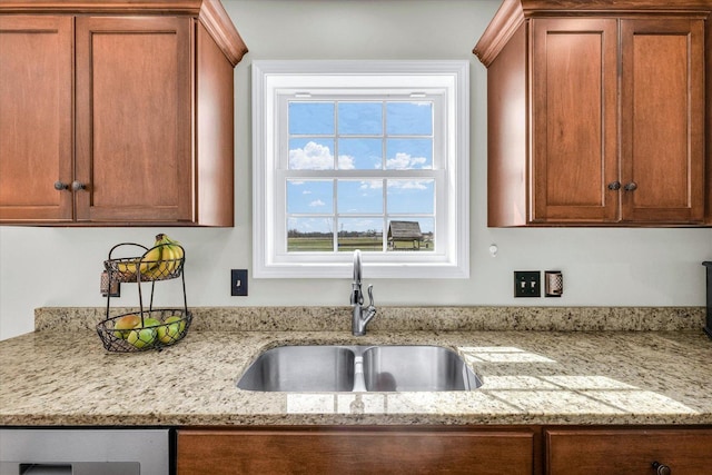 31 Lodge Trl, Monticello, IL 61856 - kitchen with a sink, brown cabinetry, light stone countertops, and wine cooler