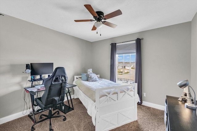 31 Lodge Trl, Monticello, IL 61856 - carpeted bedroom featuring baseboards, an office area, and ceiling fan