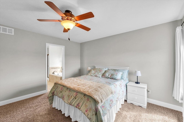 31 Lodge Trl, Monticello, IL 61856 - bedroom featuring carpet, baseboards, ensuite bath, and a ceiling fan