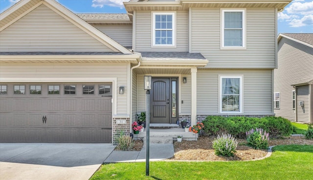 31 Lodge Trl, Monticello, IL 61856 - view of front of property with driveway, an attached garage, and roof with shingles