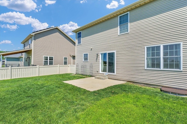 31 Lodge Trl, Monticello, IL 61856 - rear view of house with a patio area
