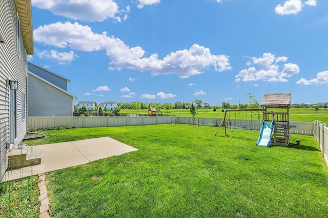 31 Lodge Trl, Monticello, IL 61856 - view of yard featuring a playground and a patio