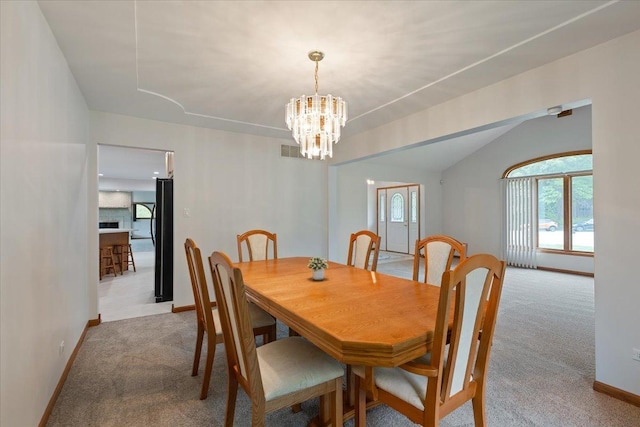 2261 E Gaisor Dr, Crete, IL 60417 - dining area featuring carpet floors, baseboards, and a chandelier