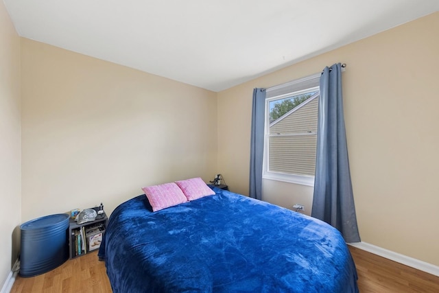 122 E Sherman St, Bartlett, IL 60103 - bedroom with baseboards and wood finished floors