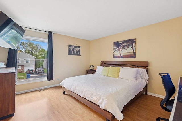 122 E Sherman St, Bartlett, IL 60103 - bedroom with baseboards and wood finished floors