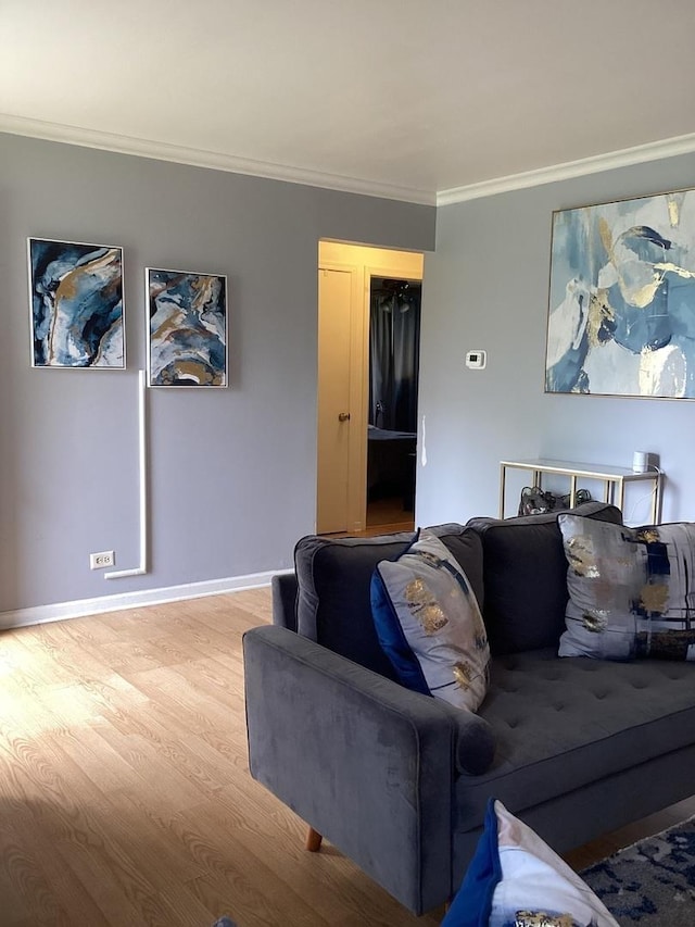 237 Marquette St, Park Forest, IL 60466 - living room featuring wood finished floors, ornamental molding, and baseboards