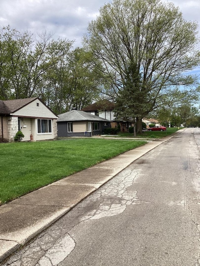 237 Marquette St, Park Forest, IL 60466 - view of front of house with a front lawn