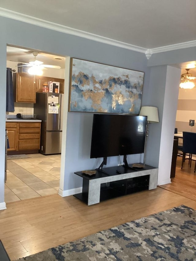 237 Marquette St, Park Forest, IL 60466 - living area featuring crown molding, ceiling fan, light wood-style flooring, and baseboards