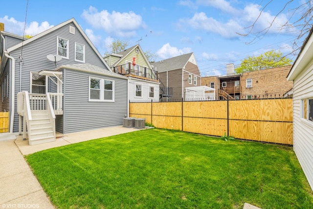 3311 W Belle Plaine Ave, Chicago, IL 60618 - rear view of house with a patio