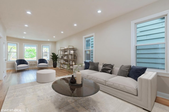 3311 W Belle Plaine Ave, Chicago, IL 60618 - living area featuring wood finished floors, recessed lighting, and baseboards