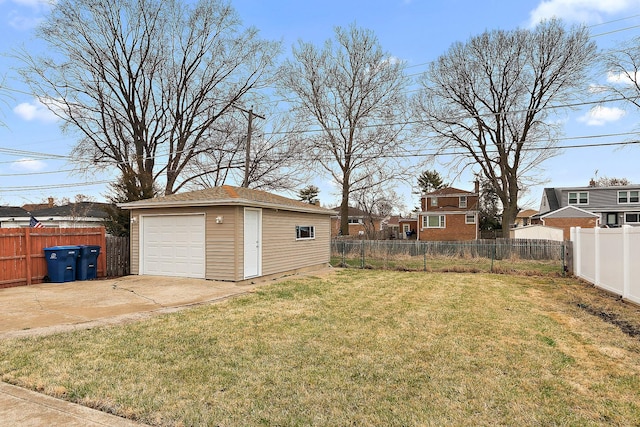 1521 N Wolf Rd, Berkeley, IL 60163 - view of yard with a garage, an outdoor structure, and concrete driveway