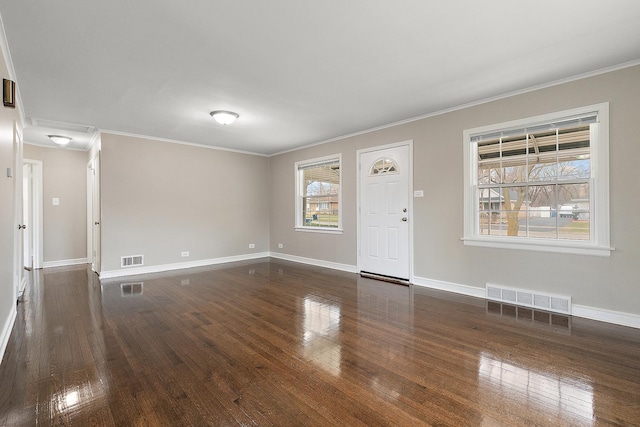 1521 N Wolf Rd, Berkeley, IL 60163 - unfurnished living room featuring ornamental molding, dark wood-style floors, and baseboards