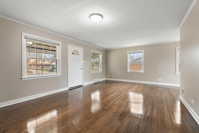 1521 N Wolf Rd, Berkeley, IL 60163 - foyer entrance featuring ornamental molding, baseboards, and dark wood-style floors