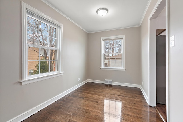 1521 N Wolf Rd, Berkeley, IL 60163 - spare room with crown molding, dark wood-style floors, and baseboards