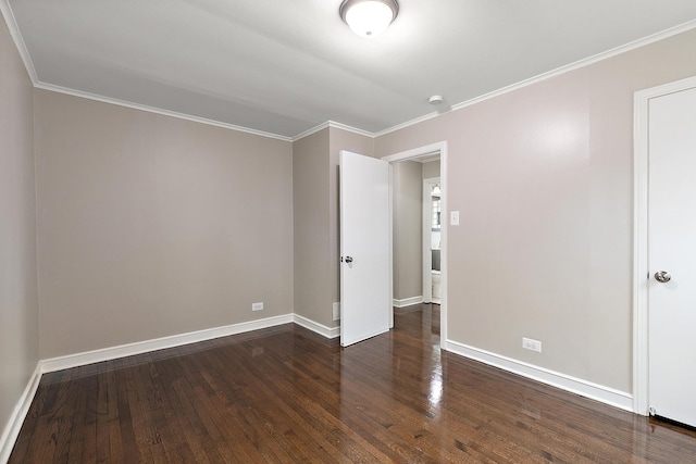 1521 N Wolf Rd, Berkeley, IL 60163 - unfurnished room featuring dark wood finished floors, baseboards, and crown molding