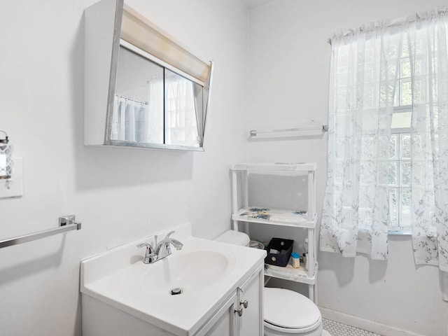 8423 S Paulina St, Chicago, IL 60620 - bathroom with plenty of natural light, vanity, and toilet