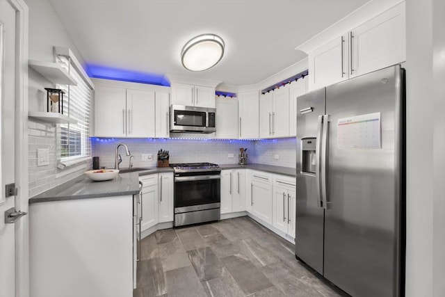 4401 Kingston Ave, Lisle, IL 60532 - kitchen with stainless steel appliances, open shelves, dark countertops, a sink, and white cabinets