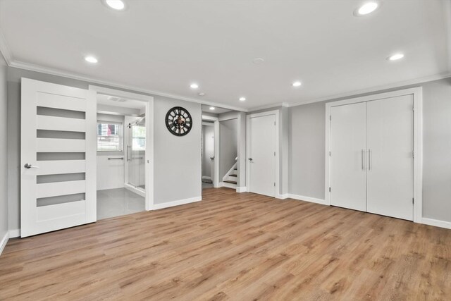 4401 Kingston Ave, Lisle, IL 60532 - basement featuring crown molding, recessed lighting, light wood-type flooring, stairway, and baseboards