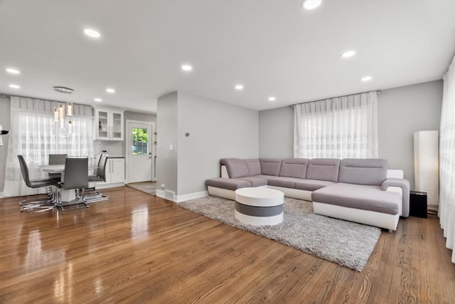 4401 Kingston Ave, Lisle, IL 60532 - living room with wood finished floors, recessed lighting, and baseboards