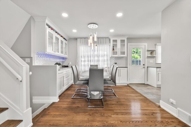 4401 Kingston Ave, Lisle, IL 60532 - dining room with stairway, wood finished floors, recessed lighting, and baseboards