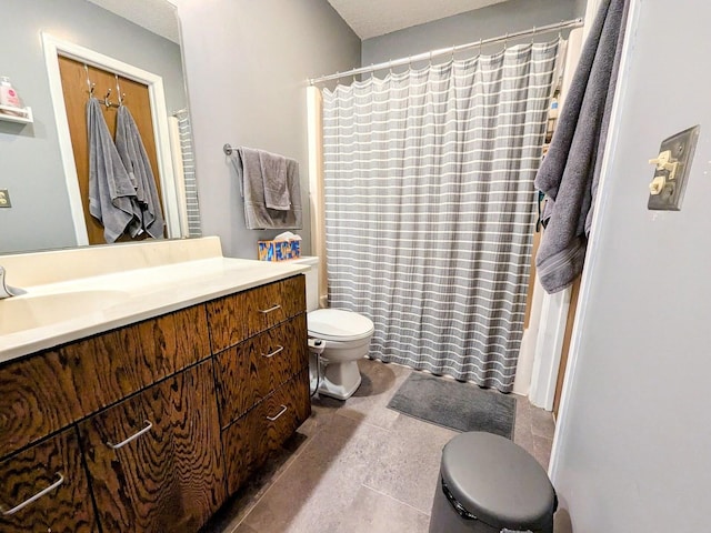 2176 Harbortown Cir Unit 2176, Champaign, IL 61821 - bathroom featuring toilet, vanity, curtained shower, and tile patterned floors
