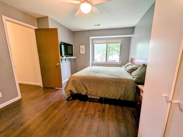2176 Harbortown Cir Unit 2176, Champaign, IL 61821 - bedroom with wood finished floors, a textured ceiling, ceiling fan, and baseboards