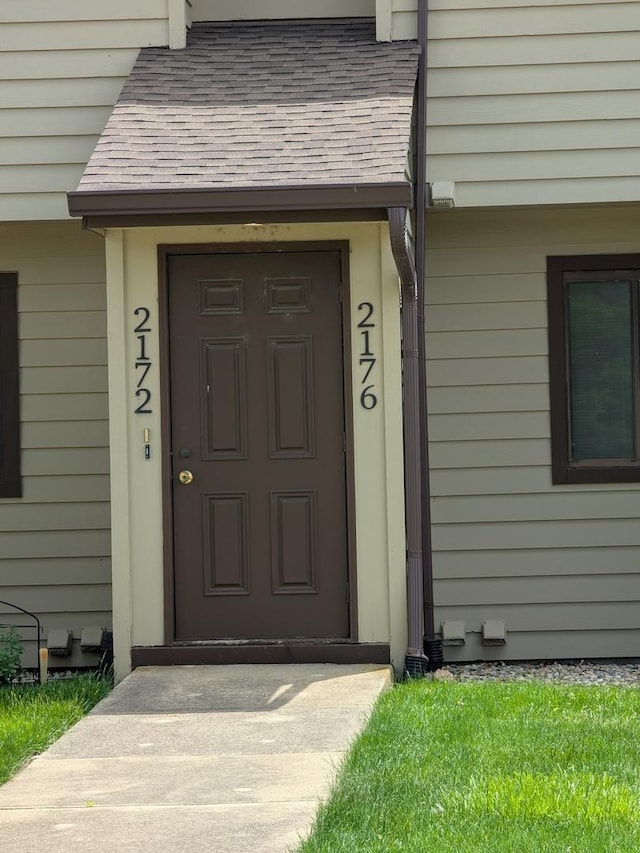 2176 Harbortown Cir Unit 2176, Champaign, IL 61821 - property entrance featuring roof with shingles