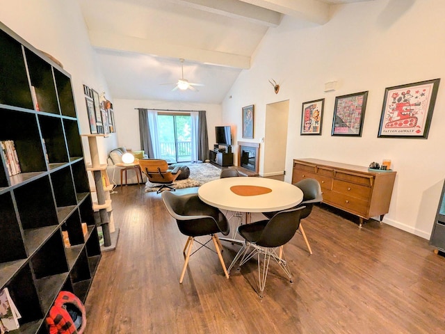 2176 Harbortown Cir Unit 2176, Champaign, IL 61821 - dining area featuring wood finished floors, beam ceiling, a ceiling fan, baseboards, and high vaulted ceiling