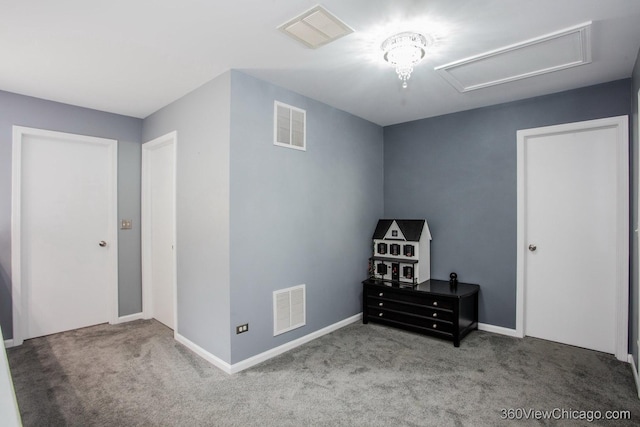 carpeted bedroom with baseboards