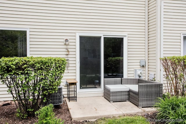 doorway to property with a patio area