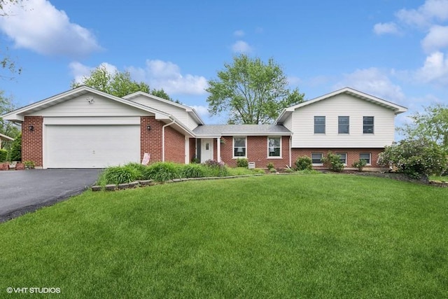 18457 Virginia Ln, Mokena, IL 60448 - view of front facade with brick siding, an attached garage, driveway, and a front lawn