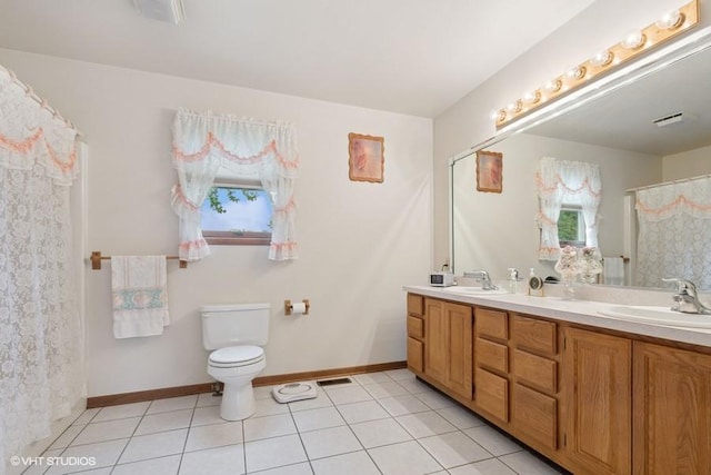 18457 Virginia Ln, Mokena, IL 60448 - full bath with double vanity, tile patterned flooring, toilet, and baseboards