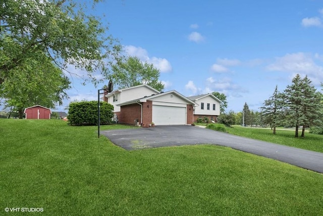 18457 Virginia Ln, Mokena, IL 60448 - view of front facade featuring brick siding, driveway, a front yard, and a garage