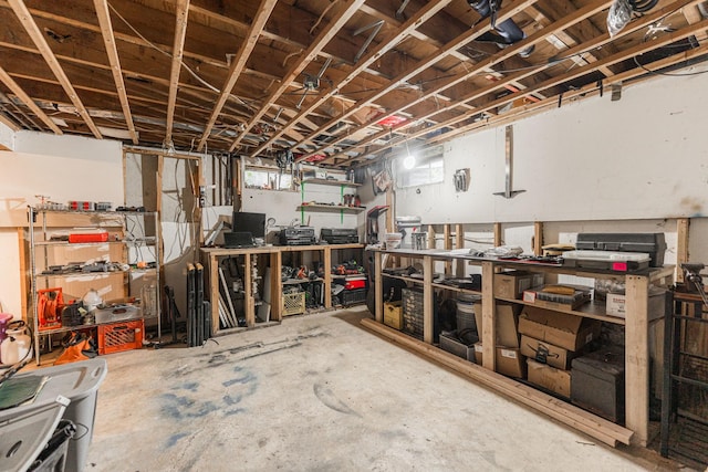 1409 E Stonehenge Dr Unit 1409, Sycamore, IL 60178 - basement featuring a workshop area