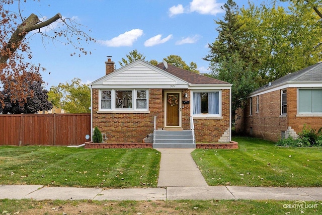 521 N Elm St, Hillside, IL 60162 - bungalow-style home featuring brick siding and a chimney