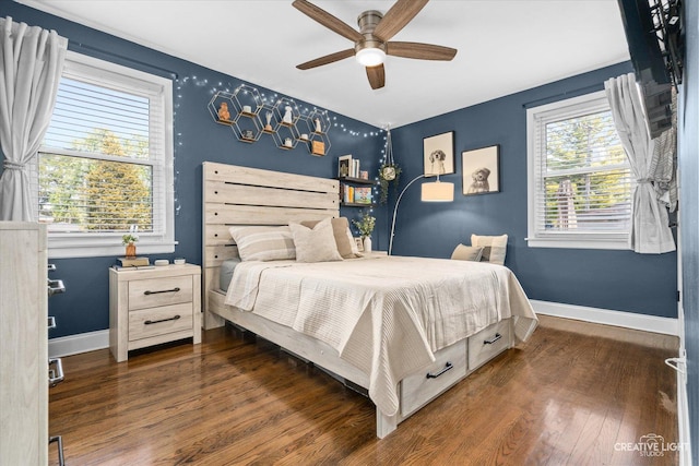 521 N Elm St, Hillside, IL 60162 - bedroom featuring baseboards, wood finished floors, an accent wall, and ceiling fan